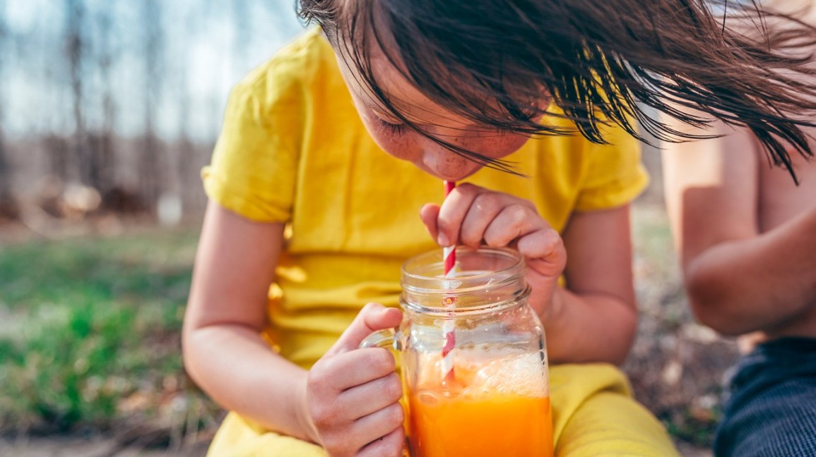 Girl Drinking Juice